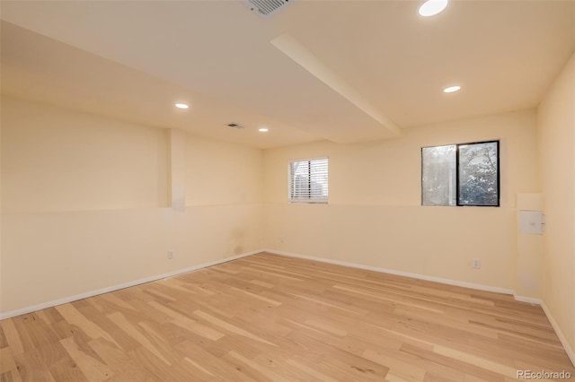 spare room with light wood-type flooring