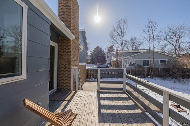 view of snow covered deck