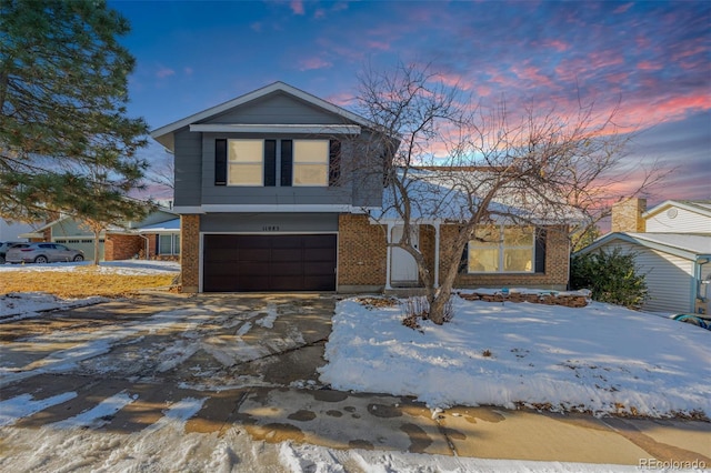 view of front of property with a garage