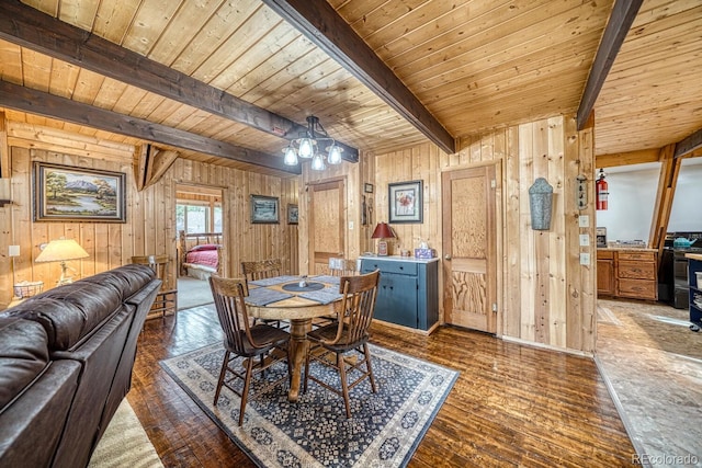 16495 Mt Princeton Rd, Buena Vista, CO 81211 - dining area featuring wooden walls, wood finished floors, wood ceiling with exposed beams, and a chandelier