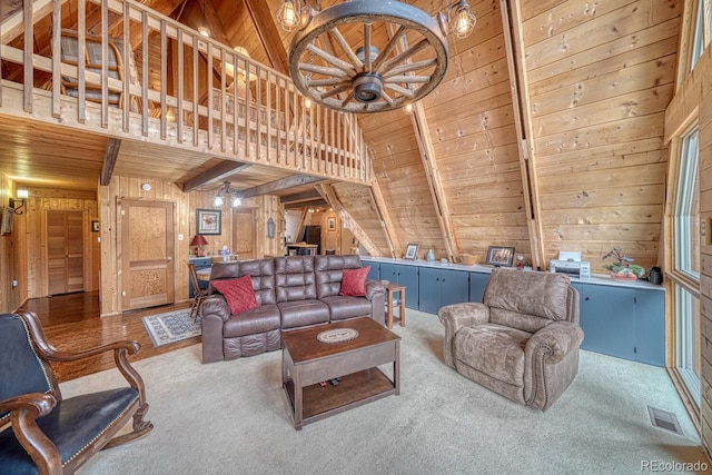 16495 Mt Princeton Rd, Buena Vista, CO 81211 - living room with wood ceiling, wood walls, carpet, and a chandelier