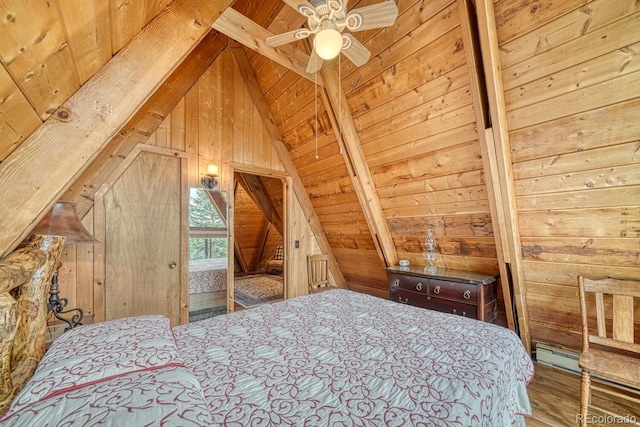 16495 Mt Princeton Rd, Buena Vista, CO 81211 - bedroom with wood walls, wood ceiling, wood finished floors, and a baseboard radiator