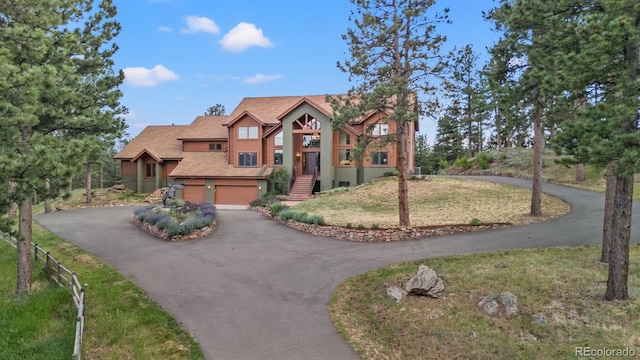 view of front of home with a garage