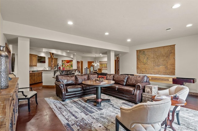 living room featuring concrete floors