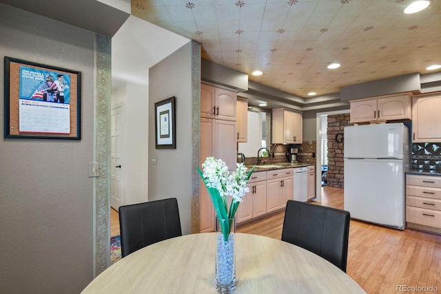 dining room featuring light wood finished floors