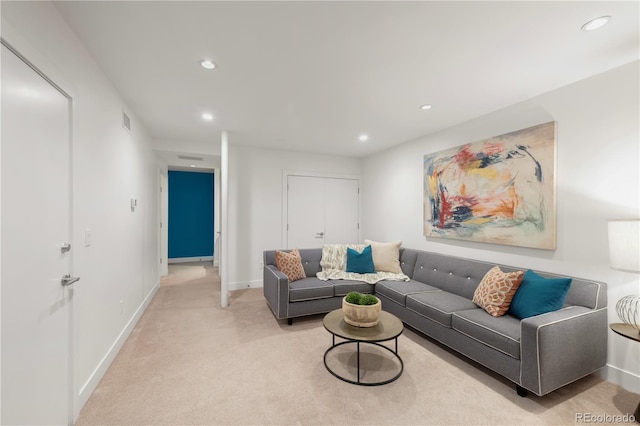 living area featuring recessed lighting, visible vents, light carpet, and baseboards