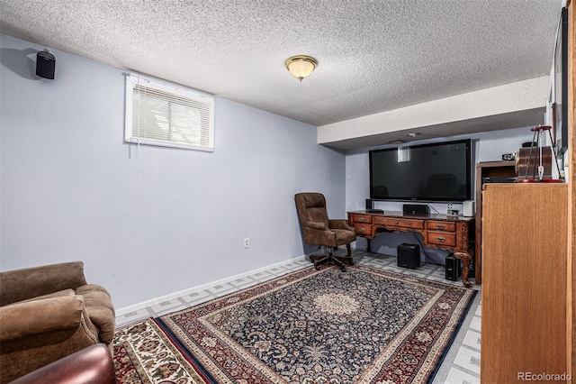 living room featuring a textured ceiling