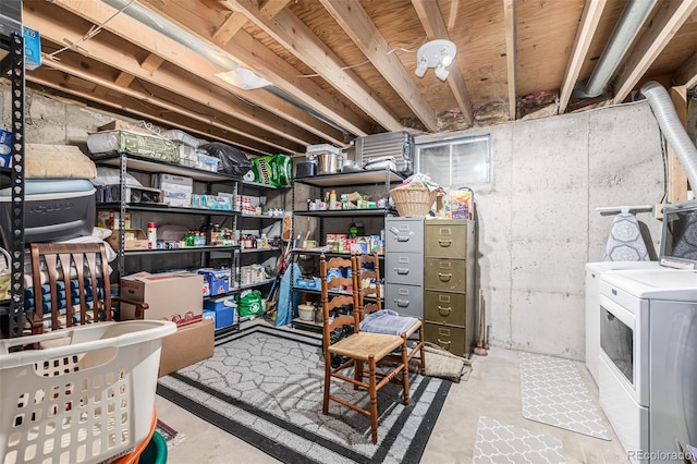 storage room with separate washer and dryer