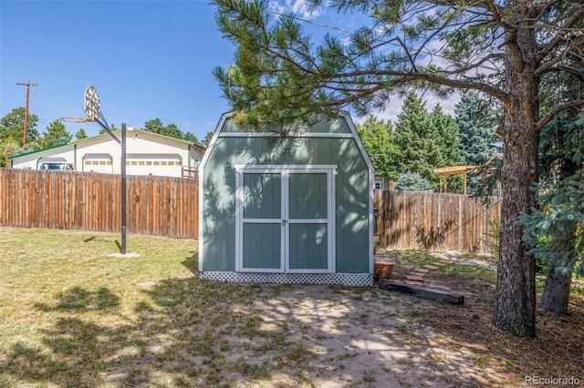 view of outdoor structure featuring a lawn