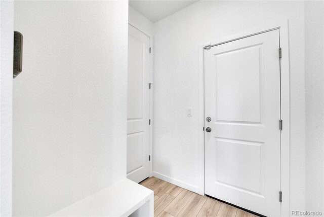 mudroom featuring light wood finished floors