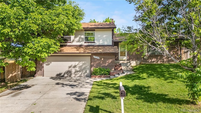 19398 E Eastman Pl, Aurora, CO 80013 - view of front of house with brick siding, concrete driveway, and a garage