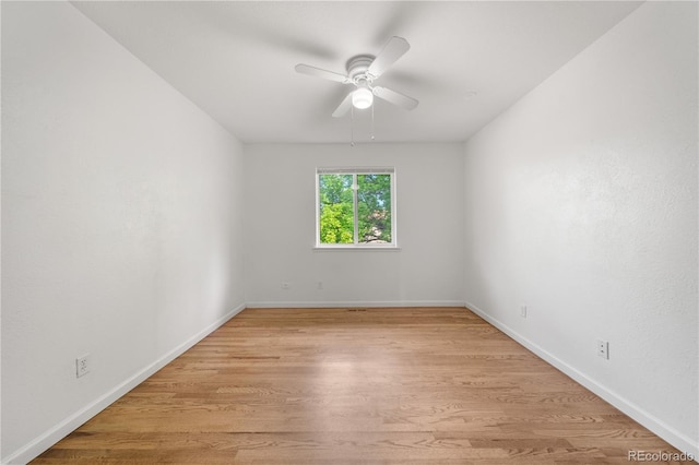 19398 E Eastman Pl, Aurora, CO 80013 - unfurnished room with a ceiling fan, light wood finished floors, and baseboards