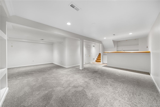 19398 E Eastman Pl, Aurora, CO 80013 - unfurnished living room with carpet floors, baseboards, recessed lighting, and stairway