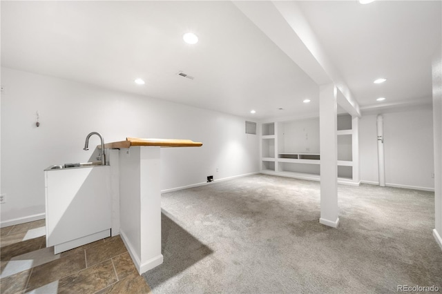 19398 E Eastman Pl, Aurora, CO 80013 - finished basement with a sink, recessed lighting, carpet flooring, baseboards, and built in features