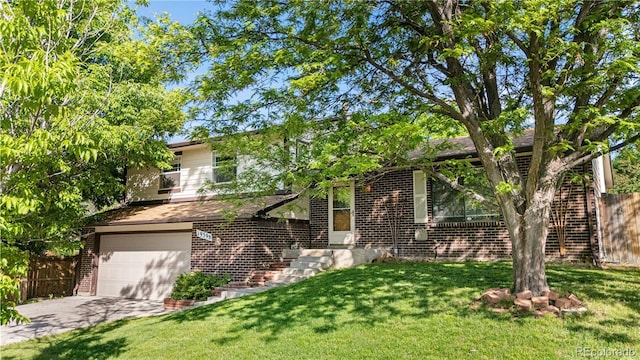 19398 E Eastman Pl, Aurora, CO 80013 - obstructed view of property featuring brick siding, driveway, and a garage