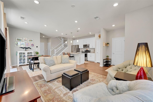 living room with light wood-type flooring