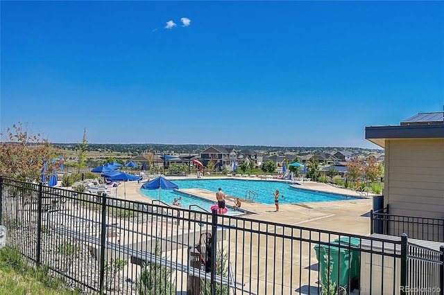 view of pool featuring a patio area