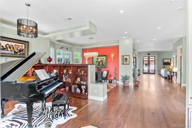 1344 S Saint Paul St, Denver, CO 80210 - living area with wood finished floors, a chandelier, and recessed lighting