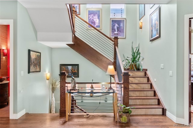 1344 S Saint Paul St, Denver, CO 80210 - stairway with wood finished floors and baseboards