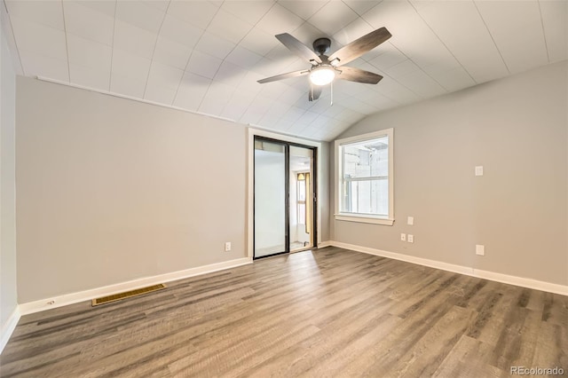 1187 Syracuse St, Denver, CO 80220 - unfurnished bedroom featuring wood finished floors, ceiling fan, and vaulted ceiling