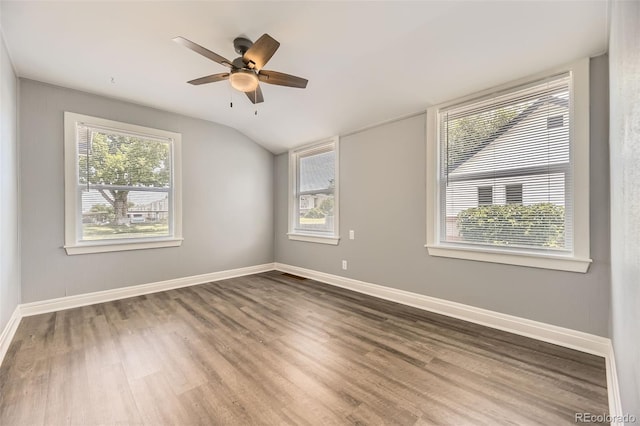 1187 Syracuse St, Denver, CO 80220 - unfurnished room with wood finished floors, healthy amount of natural light, ceiling fan, and vaulted ceiling