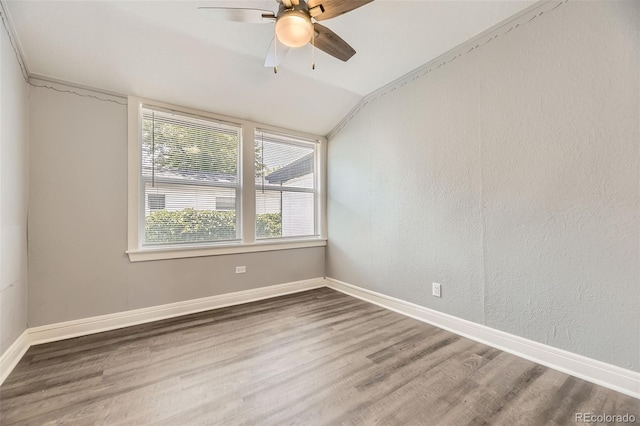 1187 Syracuse St, Denver, CO 80220 - spare room with wood finished floors, ceiling fan, and vaulted ceiling