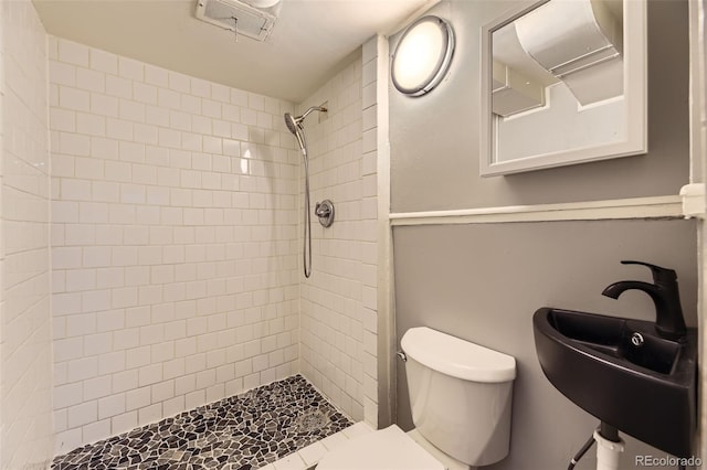 1187 Syracuse St, Denver, CO 80220 - full bathroom featuring toilet and a tile shower