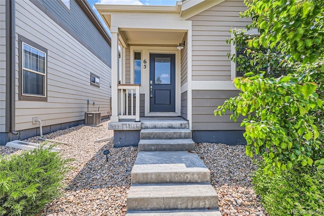 65 Avocet Ct, Longmont, CO 80501 - property entrance featuring central air condition unit