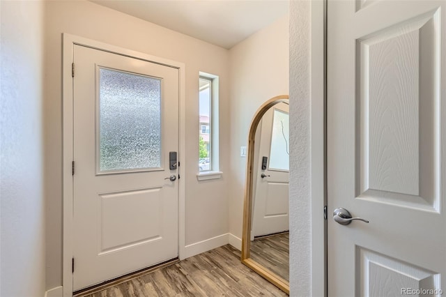 65 Avocet Ct, Longmont, CO 80501 - entryway with light wood finished floors and baseboards