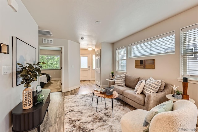 65 Avocet Ct, Longmont, CO 80501 - living room with wood finished floors and baseboards