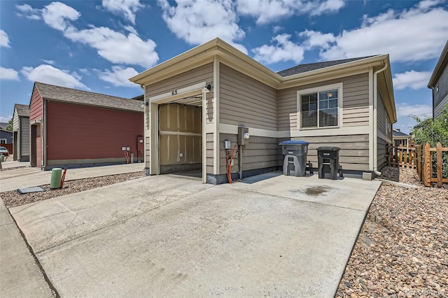 65 Avocet Ct, Longmont, CO 80501 - view of front of property with driveway and a garage