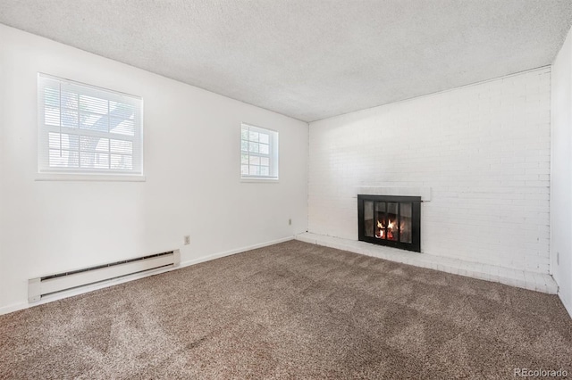5372 E 108th Pl, Thornton, CO 80233 - unfurnished living room with baseboard heating, carpet flooring, a textured ceiling, and a brick fireplace