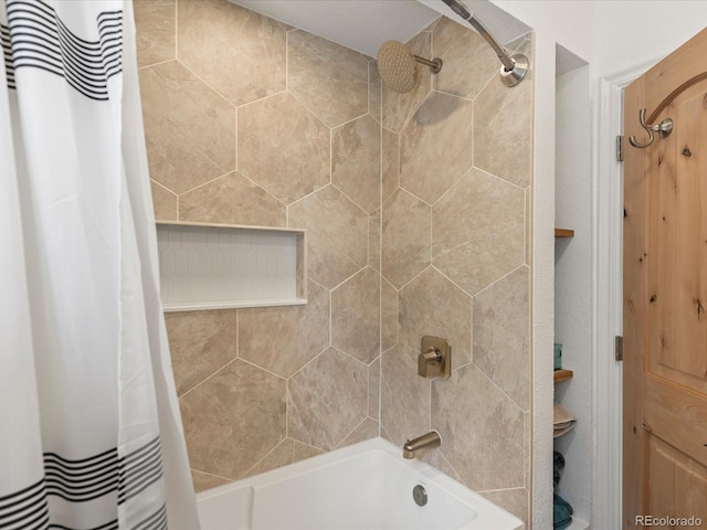 bathroom with shower / bathtub combination with curtain