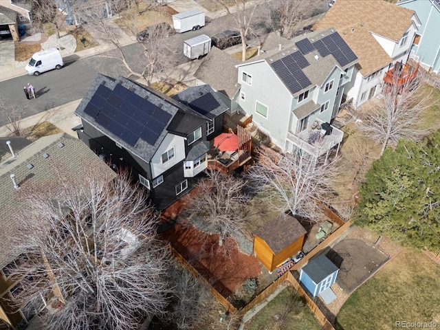 birds eye view of property with a residential view