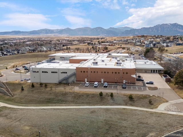 birds eye view of property featuring a mountain view