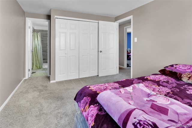 bedroom featuring carpet and a closet