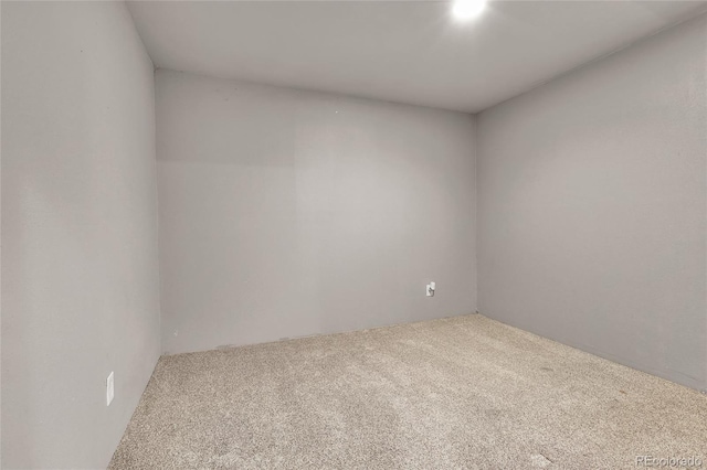 unfurnished room with carpet floors