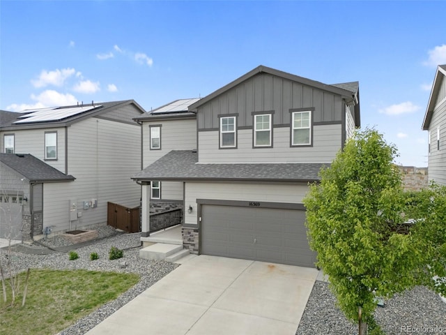 16369 Alberta Dr, Parker, CO 80134 - view of front of house featuring board and batten siding, a garage, concrete driveway, and roof with shingles