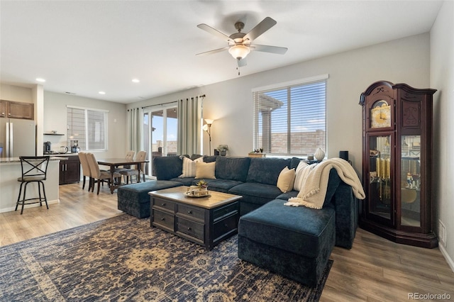 16369 Alberta Dr, Parker, CO 80134 - living area with wood finished floors, a ceiling fan, recessed lighting, and baseboards