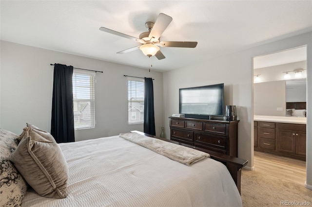 16369 Alberta Dr, Parker, CO 80134 - bedroom featuring light carpet, ensuite bath, and ceiling fan
