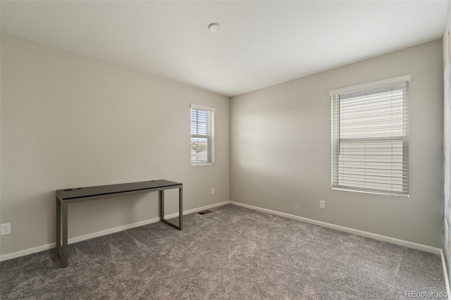 16369 Alberta Dr, Parker, CO 80134 - carpeted spare room featuring baseboards