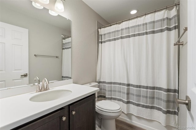 16369 Alberta Dr, Parker, CO 80134 - full bath with toilet, wood finished floors, vanity, and shower / bath combo