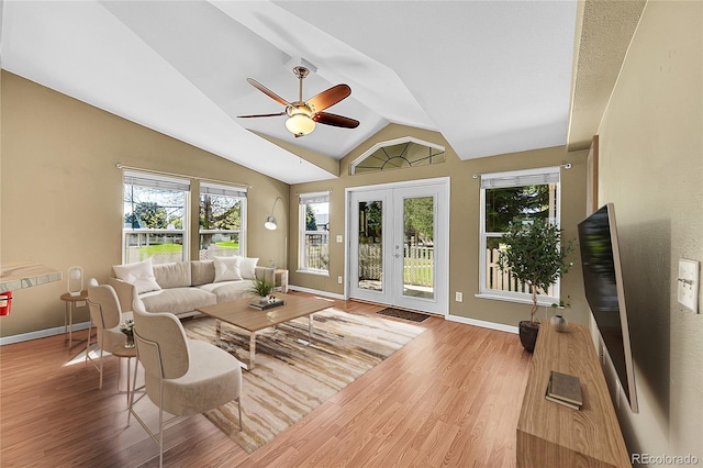 7870 Sunflower Grn Unit 151, Frederick, CO 80530 - living room featuring healthy amount of natural light, ceiling fan, wood finished floors, and vaulted ceiling