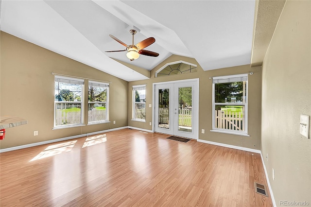 7870 Sunflower Grn Unit 151, Frederick, CO 80530 - empty room featuring a ceiling fan, light wood-style flooring, baseboards, vaulted ceiling, and french doors