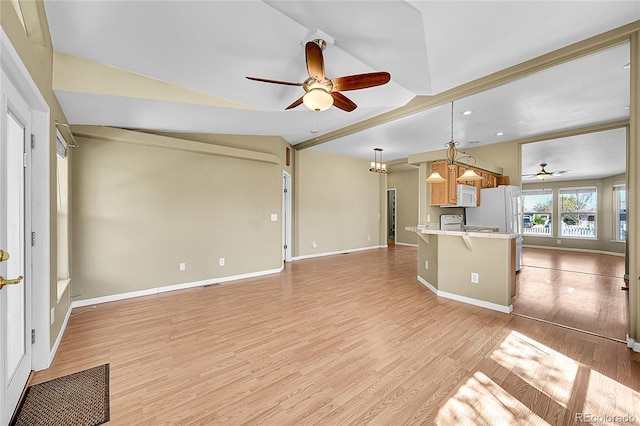 7870 Sunflower Grn Unit 151, Frederick, CO 80530 - unfurnished living room with ceiling fan, vaulted ceiling, light wood-style floors, baseboards, and recessed lighting