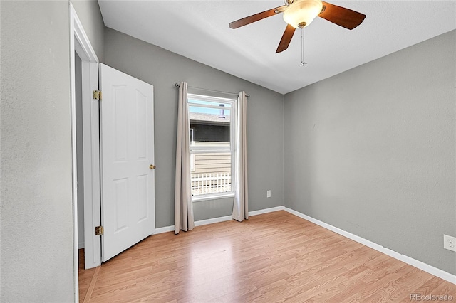 7870 Sunflower Grn Unit 151, Frederick, CO 80530 - unfurnished bedroom featuring light wood-style floors, baseboards, and a ceiling fan