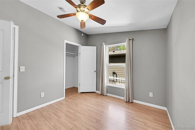 7870 Sunflower Grn Unit 151, Frederick, CO 80530 - unfurnished bedroom featuring light wood-style flooring, baseboards, and ceiling fan