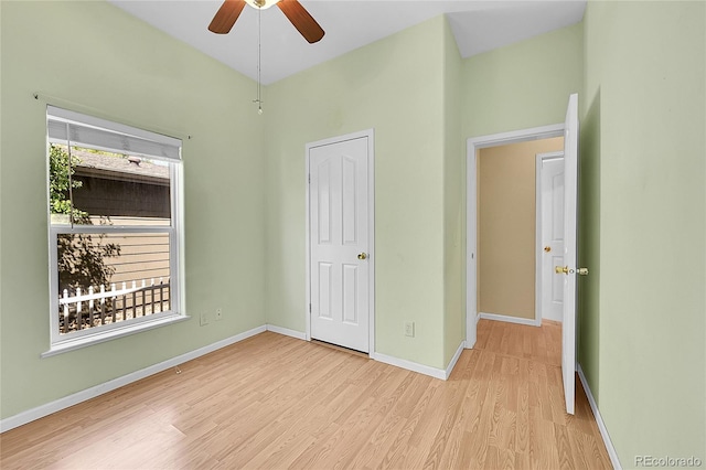 7870 Sunflower Grn Unit 151, Frederick, CO 80530 - unfurnished bedroom featuring light wood-type flooring, baseboards, and a ceiling fan