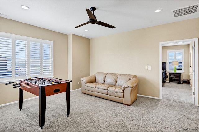 recreation room featuring carpet floors, a ceiling fan, recessed lighting, and baseboards