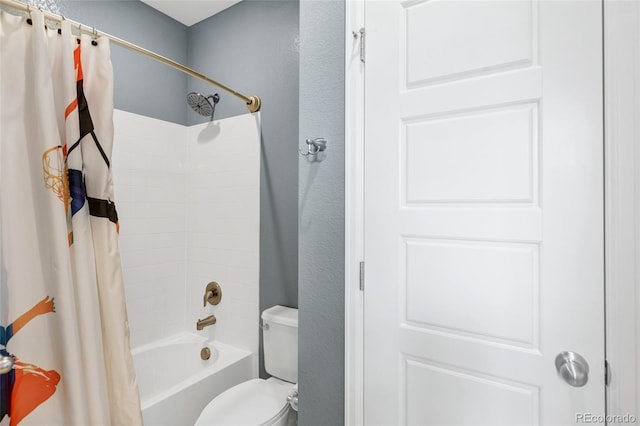 bathroom with a textured wall, toilet, and shower / bath combination with curtain